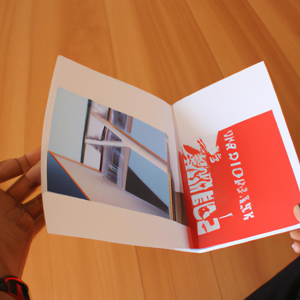 Person holding real estate brochure